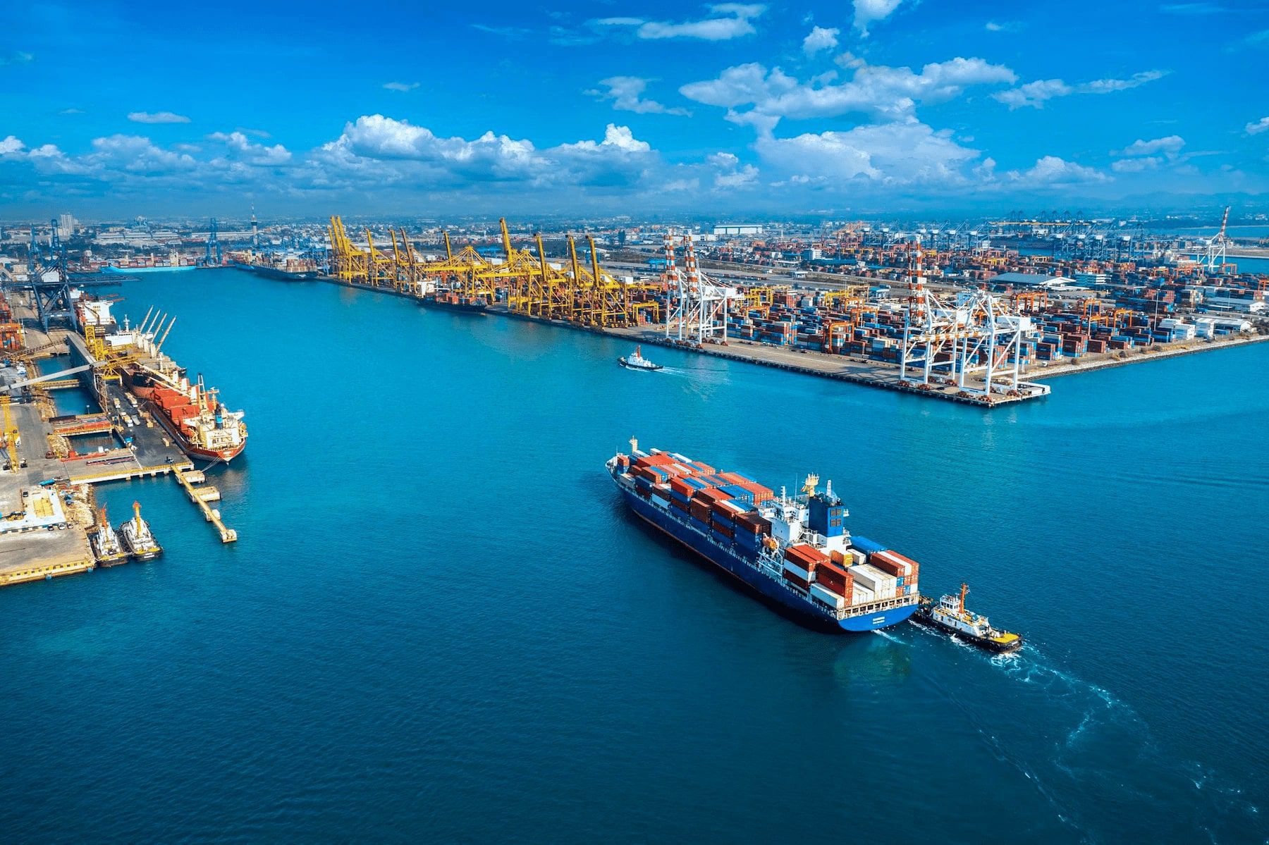 Container ship leaving a port, for the S-Line logistics web application case study